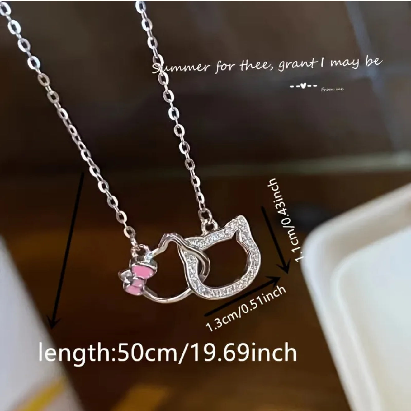 Hello Kitty Outline Pendant Necklace – Dainty Silver with Pink Bow Accent